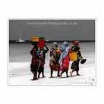 Colour composite of colourful women walking along the beach in Zanzibar, Africa.